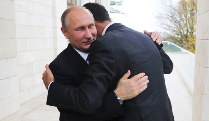 Suriye halkının katilleri Putin ve Esed sarmaş dolaş